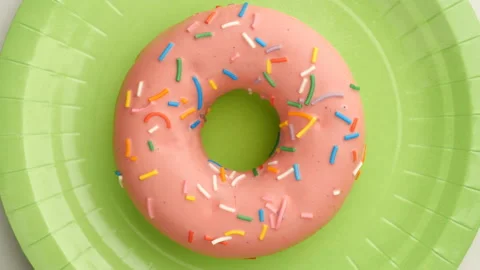 Doughnut glazed close-up. Seamless looping. 스톡 동영상 98099429