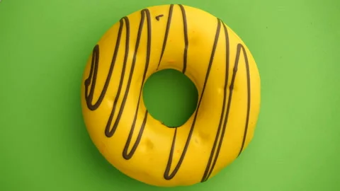 Doughnut glazed close-up. Seamless looping. Video stock 99149110