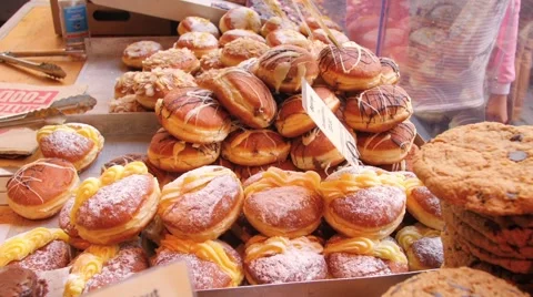 Doughnuts at a market stall Stock Footage 67419220