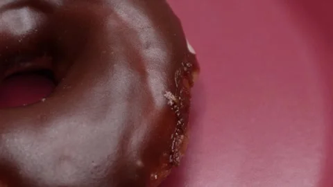 Doughnuts That Rotate 360 Degrees on the Plate Stock Footage 248566407