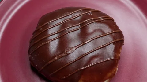 Doughnuts That Rotate 360 Degrees on the Plate Stock Footage 248567360