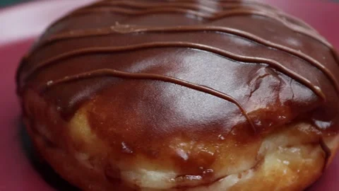 Doughnuts That Rotate 360 Degrees on the Plate Stock Footage 248567361