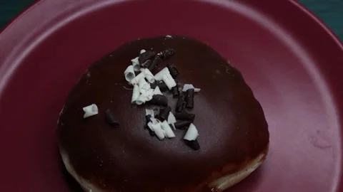 Doughnuts That Rotate 360 Degrees on the Plate Stock Footage 248567591