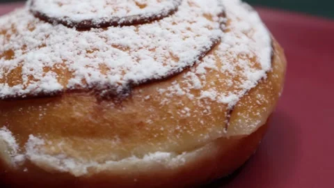 Doughnuts That Rotate 360 Degrees on the Plate Stock Footage 248568004