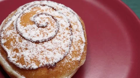 Doughnuts That Rotate 360 Degrees on the Plate Stock Footage 248568043