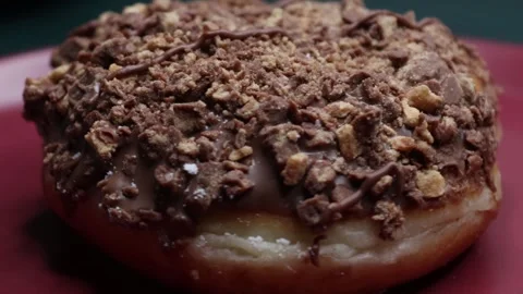 Doughnuts That Rotate 360 Degrees on the Plate Stock Footage 248568331