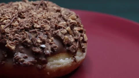 Doughnuts That Rotate 360 Degrees on the Plate Stock Footage 248568451