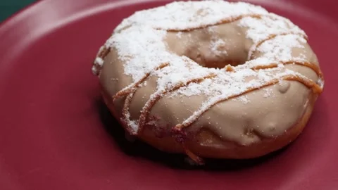 Doughnuts That Rotate 360 Degrees on the Plate Stock Footage 248569282
