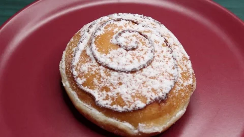 Doughnuts That Rotate 360 Degrees on the Plate Stock Footage 248569297