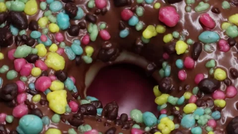 Doughnuts That Rotate 360 Degrees on the Plate Stock Footage 248569331