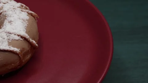 Doughnuts That Rotate 360 Degrees on the Plate Stock Footage 248569554