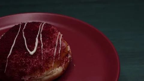 Doughnuts That Rotate 360 Degrees on the Plate Stock Footage 248569935