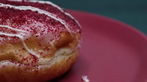 Doughnuts That Rotate 360 Degrees on the Plate Stock Footage 248569975