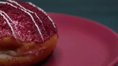 Doughnuts That Rotate 360 Degrees on the Plate Stock Footage 248570430