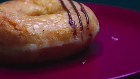 Doughnuts That Rotate 360 Degrees on the Plate Stock Footage 248570904