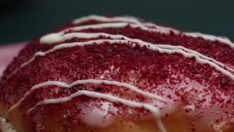 Doughnuts That Rotate 360 Degrees on the Plate Stock Footage 248571314