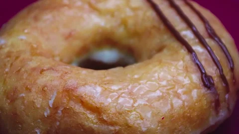 Doughnuts That Rotate 360 Degrees on the Plate Stock Footage 248571372
