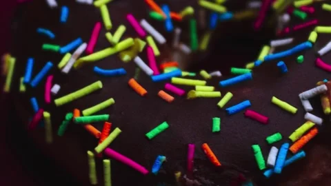 Doughnuts That Rotate 360 Degrees on the Plate Stock Footage 248571876