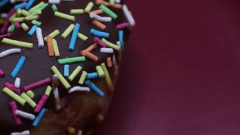 Doughnuts That Rotate 360 Degrees on the Plate Stock Footage 248572039