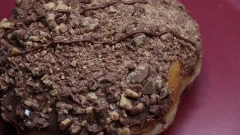 Doughnuts That Rotate 360 Degrees on the Plate Stock Footage 248572535