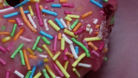 Doughnuts That Rotate 360 Degrees on the Plate Stock Footage 248572713