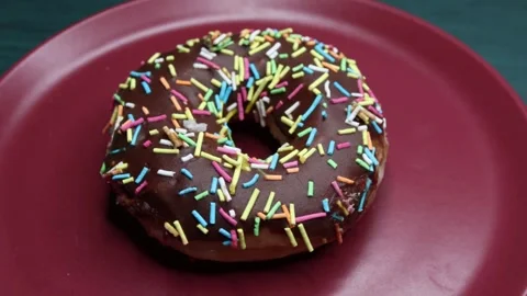 Doughnuts That Rotate 360 Degrees on the Plate Stock Footage 248572785