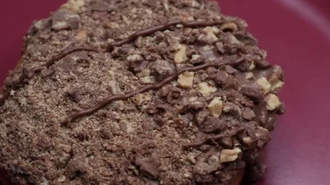 Doughnuts That Rotate 360 Degrees on the Plate Stock Footage 248573320
