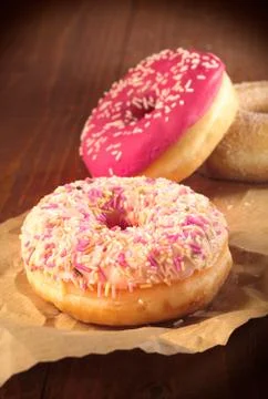 Doughnuts topped with sprinkles Stock Photos