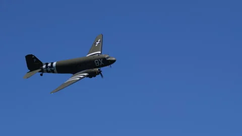 Douglas C-47 Skytrain Historic Military Transport Plane Bank Turn in Blue Sky Stock Footage 328033733