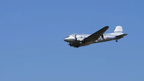 Douglas DC-3 passing Stock Footage 115129221