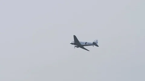 Douglas DC-3 passing Stock Footage 115129289