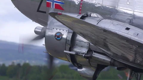 Douglas DC-3 warming up engines flames from exhaust tube Stock Footage 55839729