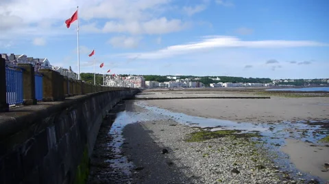 Douglas, Isle of Man with Flags on Beach Stock Footage 42787048
