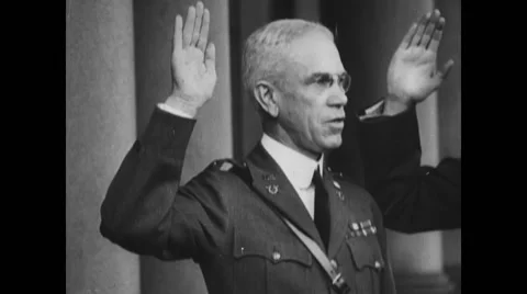 Douglas MacArthur taking oath in front of Patrick J. Hurley and military officer Video stock 43330768