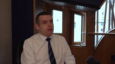 Douglas Ross: Westminster acts more like a Parliament than Holyrood Stock-Footage 329452691