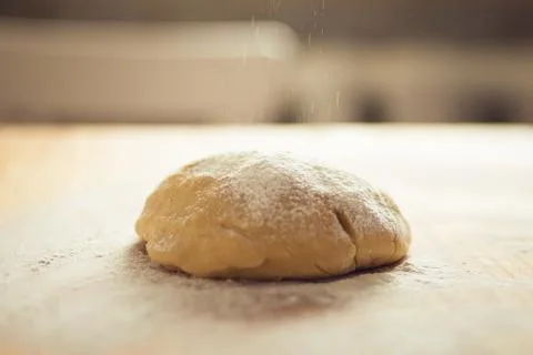 Dougn on a cutting board, back lighting Stock Photos