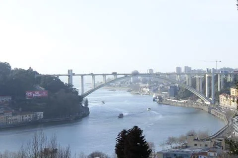 Douro river and Arrábida Bridge in afternoon Stock Photos
