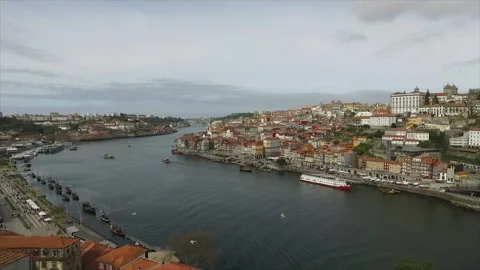 DOURO RIVER AND RIBEIRA LOOKS OVER THE BRIDGE Stock Footage