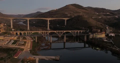 Douro River Bridge in Peso da Regua Portugal Aerial Push Out Stock Footage