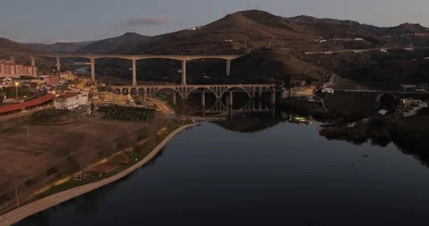 Douro River Bridge in Peso da Regua Portugal Aerial Push In Stock Footage 87387070