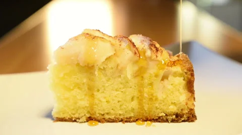 Dousing Slice of Apple Cake with Syrup Stock Footage 49286823