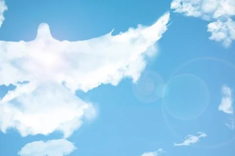 Dove bird in cloud shape soars in blue sky. Concept of love, romance and happ Stock Photos