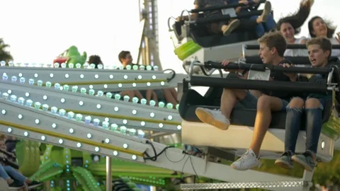 Up Down Carousel Ride in Amusement Park 7 Stock Footage 89359249