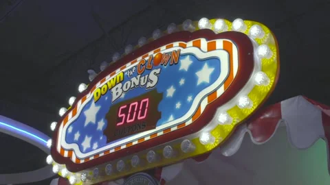 Down the clown game lights flashing arcade bonus flashy Stock Footage 233632393
