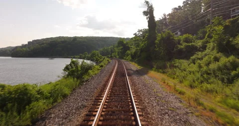 Down curving train tracks along the Hudson River in New York Stock Footage 346374554