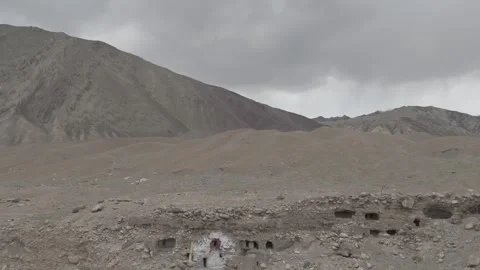 Up to Down Drone Reveal of Ancient Monastery on Ladakh Mountain Hillside in the Stock Footage 335746422
