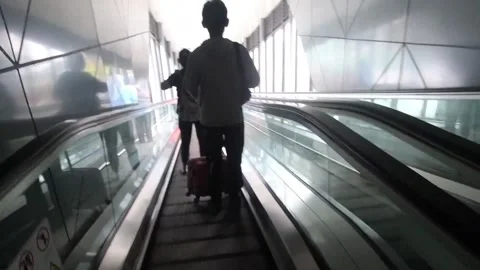 Down the escalator at Bandung train station Stock Footage 309973437