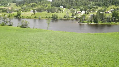 Down the field and across the river Stock Footage 158755438