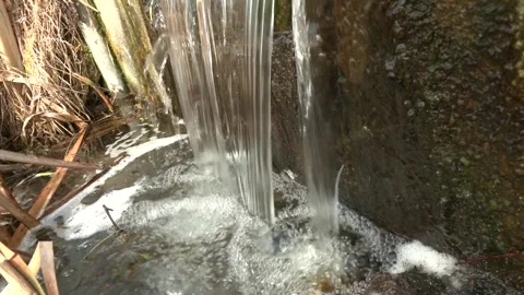Down flowing water on a weir Video stock 313444150