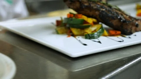 Up down line of plated food on kitchen shelf Stock-Footage 94275986